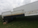 Single axle with drop side.